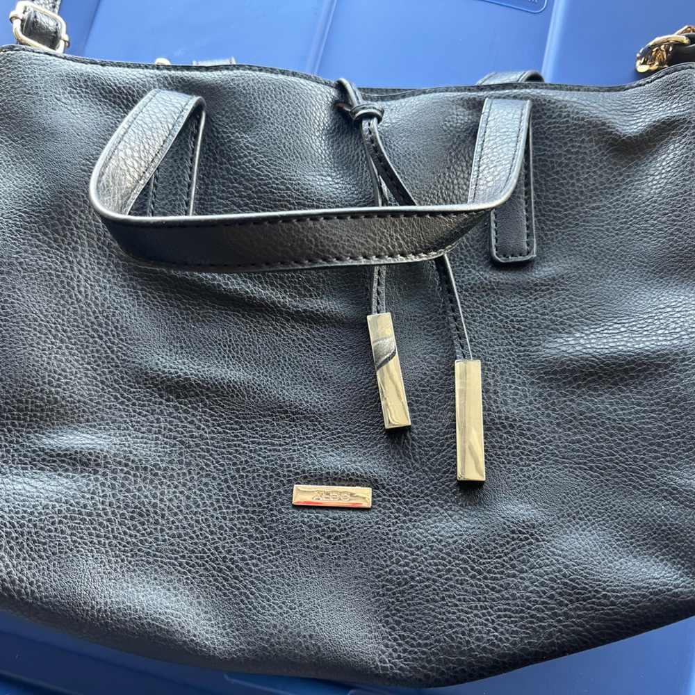 Black purse with long strap